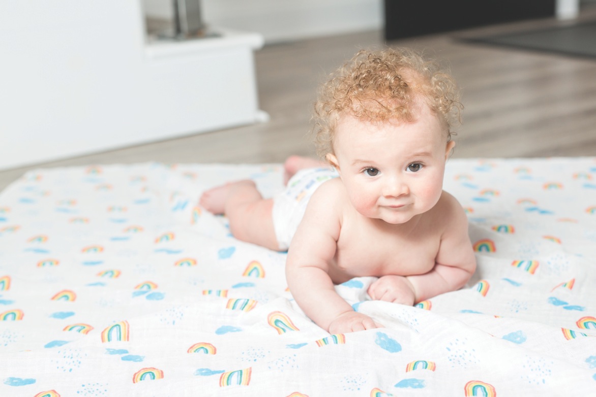 Rainbow Sky extra large, all-in-one muslin swaddling blanket from Lulujo Baby #LulujoBaby #BabyGifts #Baby #BabyBlanket