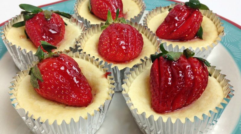 30 Days of Christmas Sweets. Mini Strawberry Cheesecakes #ChristmasSweets #Cheesecake